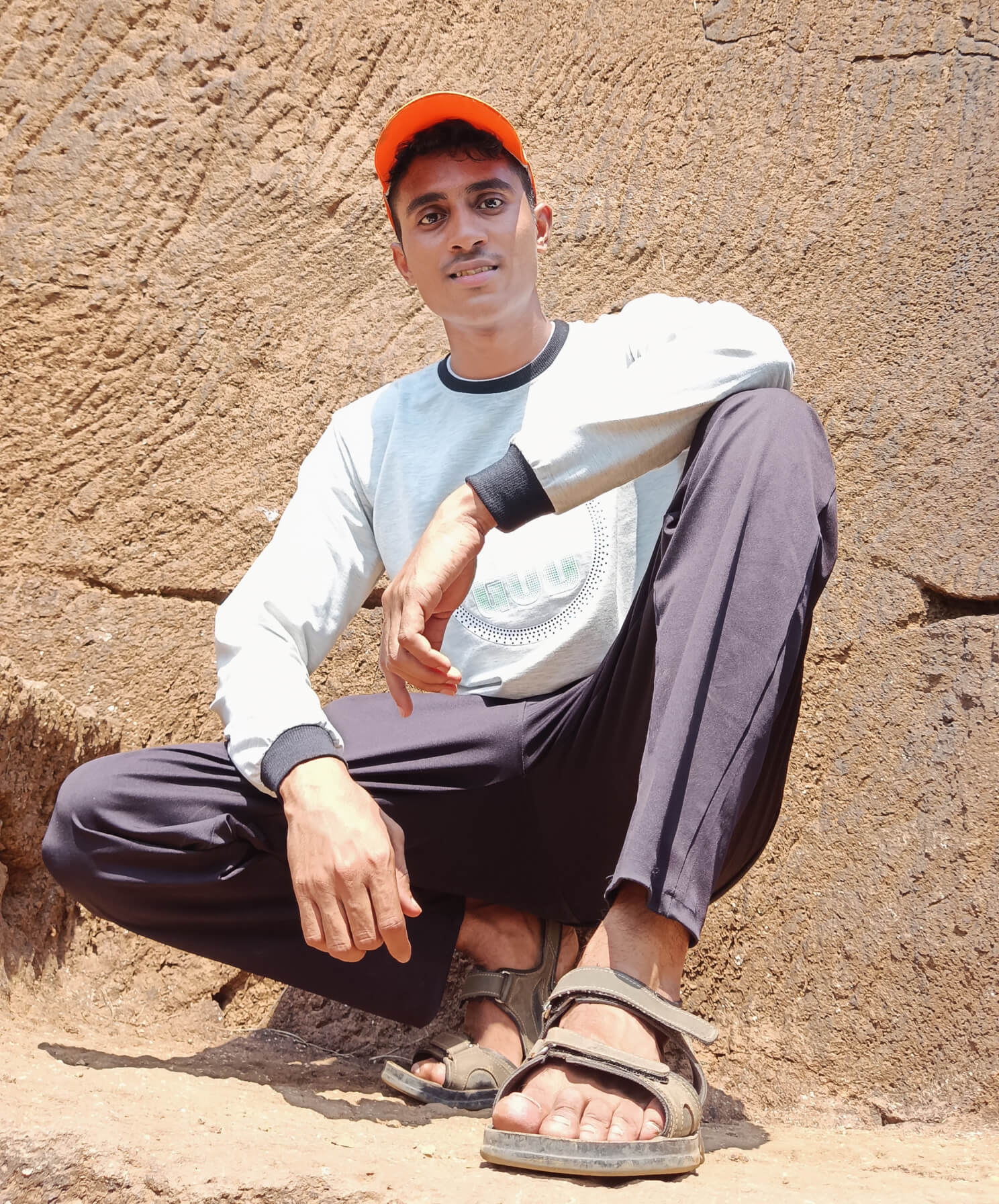 Aniket giving a sit down pose